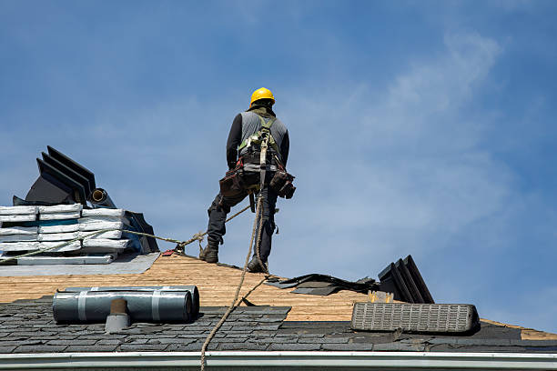 Professional Gutter Installation technician working in Liguori, MO